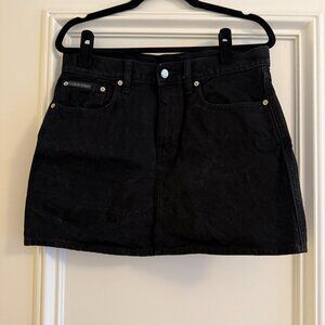 Calvin Klein: Black Denim Mini Skirt, Size: 29